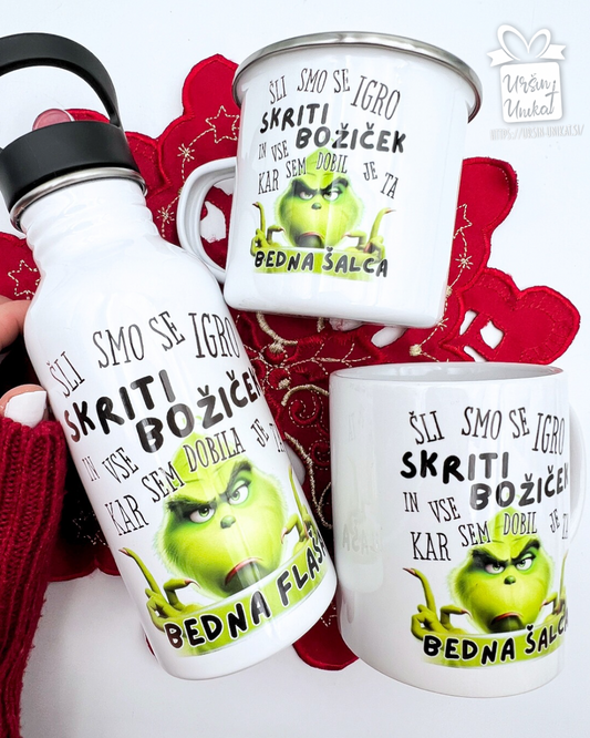 SKODELICA ALI JEKLENA STEKLENIČKA OZ FLAŠKA - “GRINCH SKRITI BOŽIČEK- smešno božično darilo